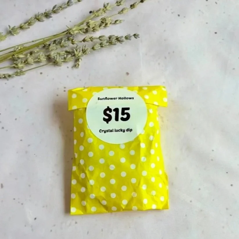 $15 yellow crystal lucky dip bag featuring a surprise assortment of genuine crystals from Sunflower Hollows