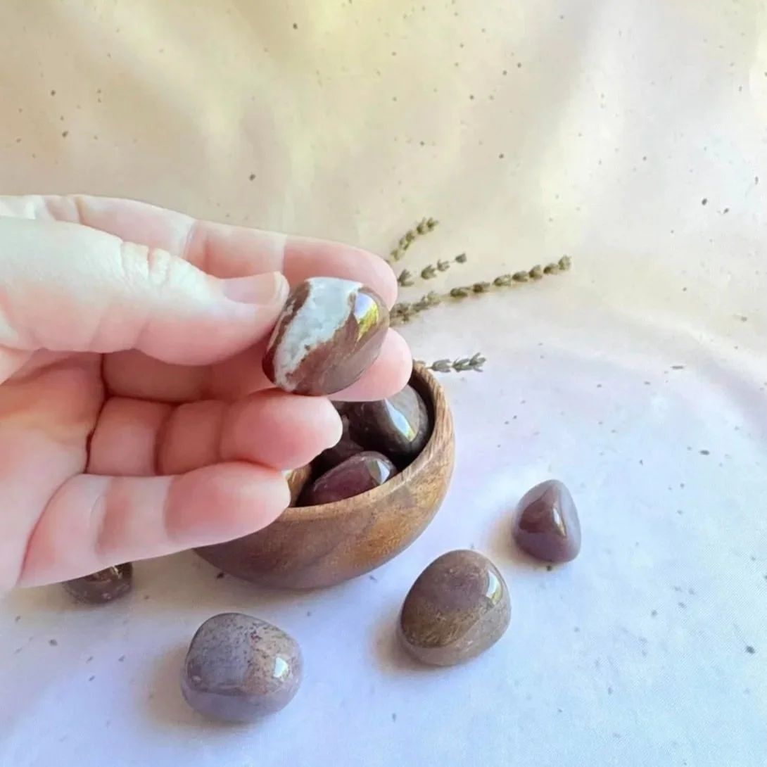 Natural Bloodstone crystal tumble displaying deep green colouring and red markings