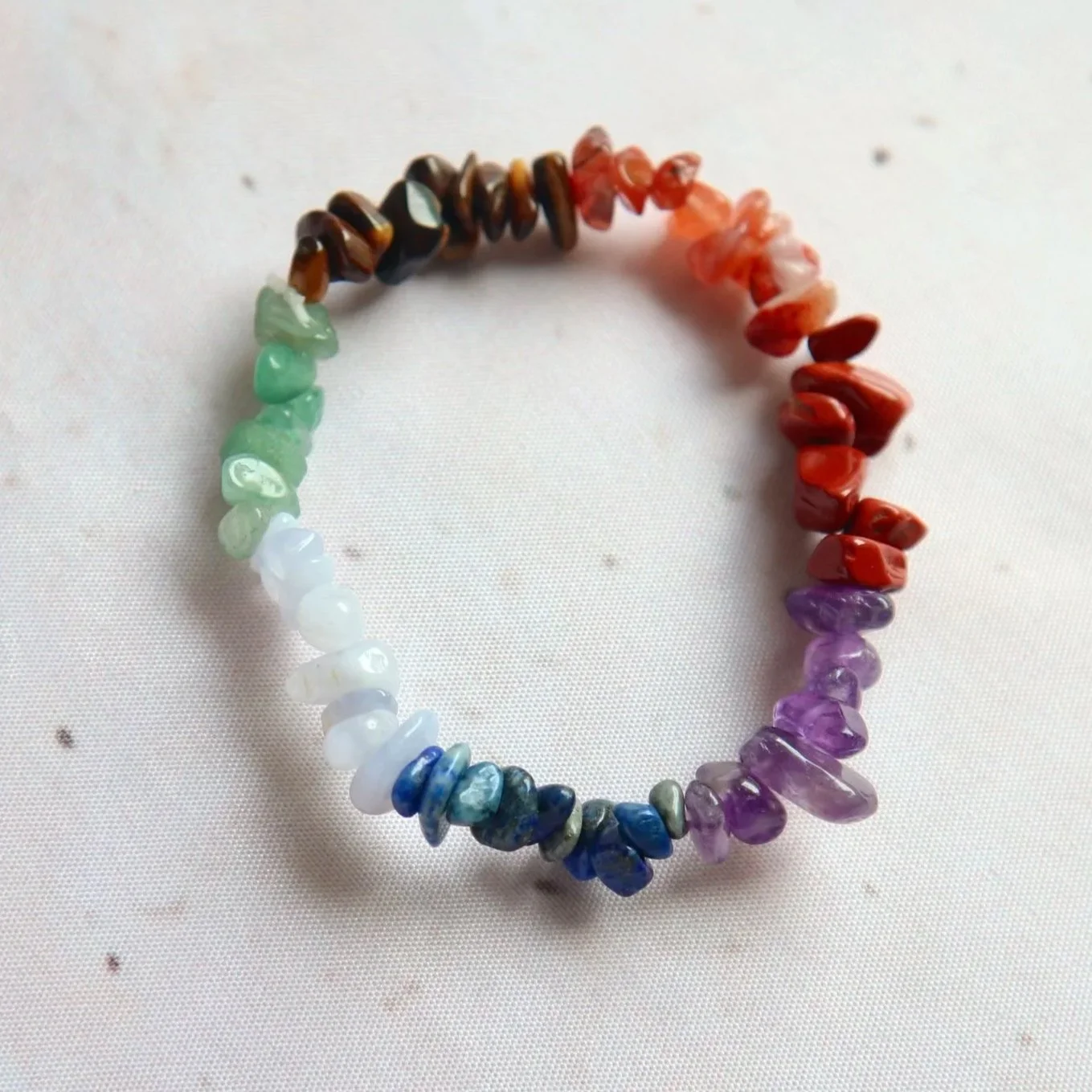 Chakra crystal chip bracelet featuring a colourful selection of natural stone chips