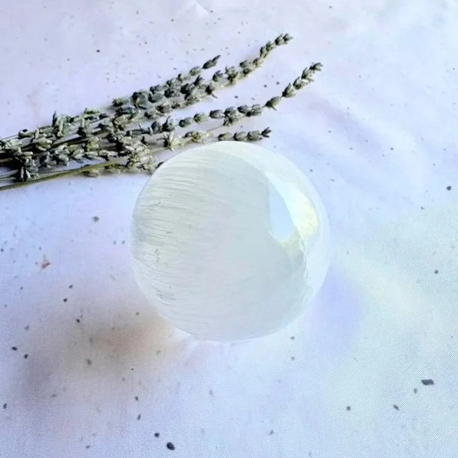 Polished Satin Spar crystal sphere commonly sold as Selenite with a silky luminous glow