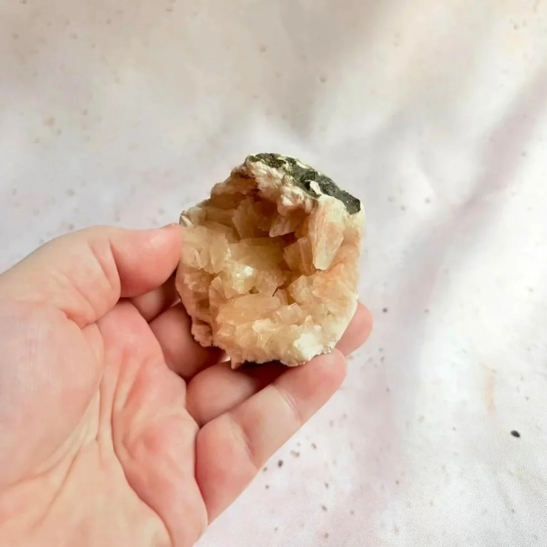 Heulandite being held by hand