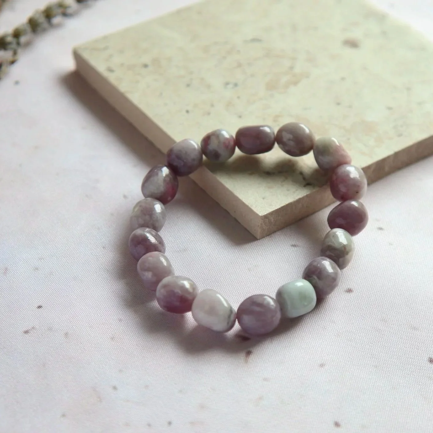 Quartz with Pink Tourmaline bracelet showing natural clear and soft pink colouring