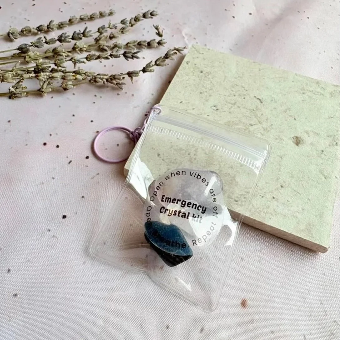 Emergency crystal bag containing three natural crystal tumbles