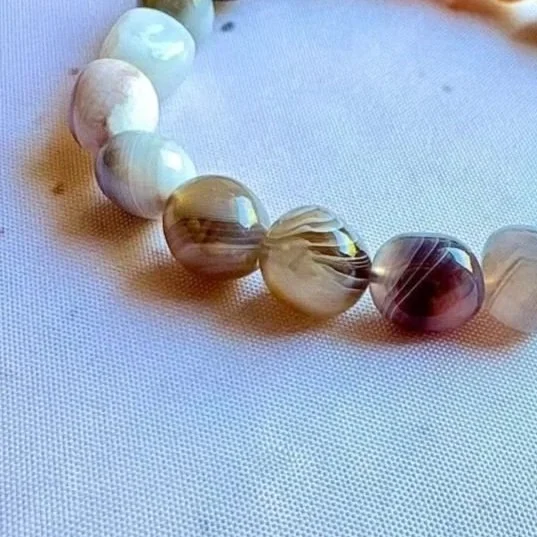 Botswana Agate crystal bracelet featuring natural earthy tones and banding