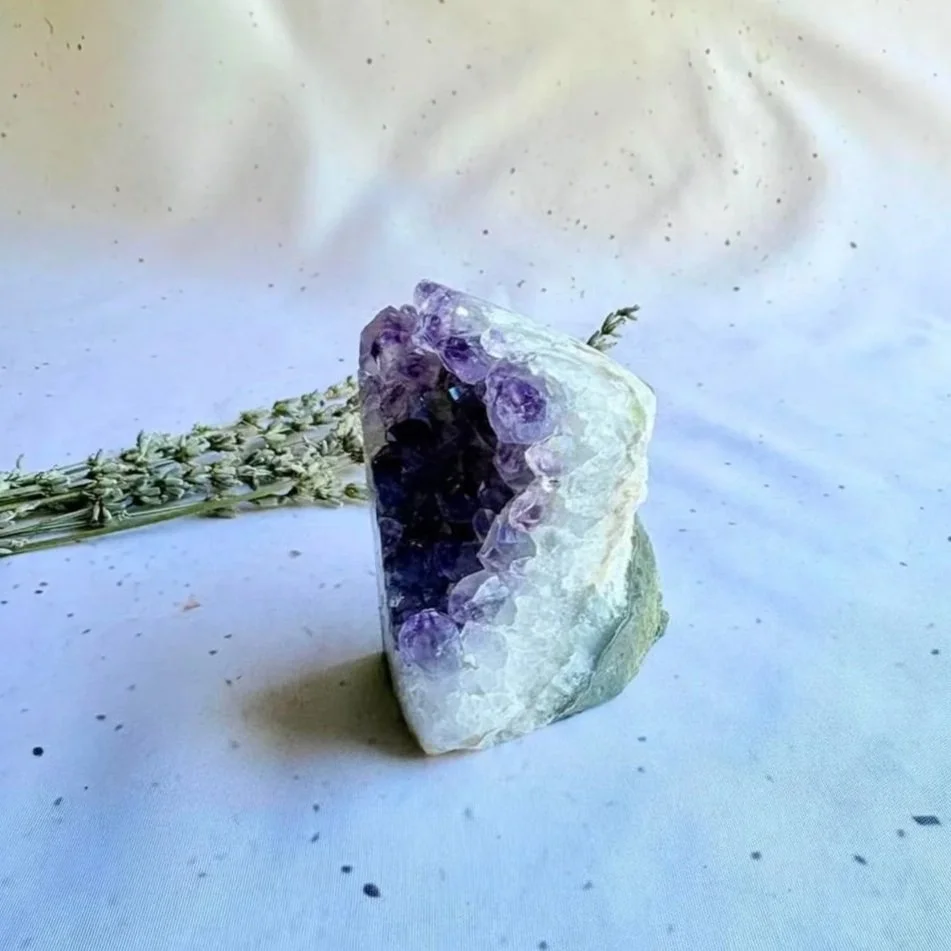 Natural purple Amethyst crystal cluster with sparkling points