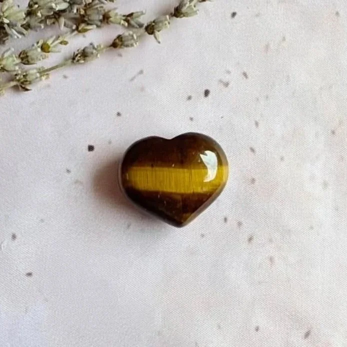 Natural Tiger's Eye puff heart measuring approximately 3cm with golden brown banding