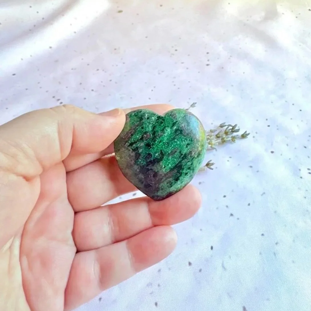 Natural polished Ruby in Zoisite crystal heart featuring ruby inclusions in green zoisite