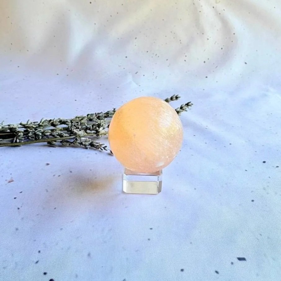 Natural Peach Satin Spar sphere measuring approximately 3.5cm in diameter