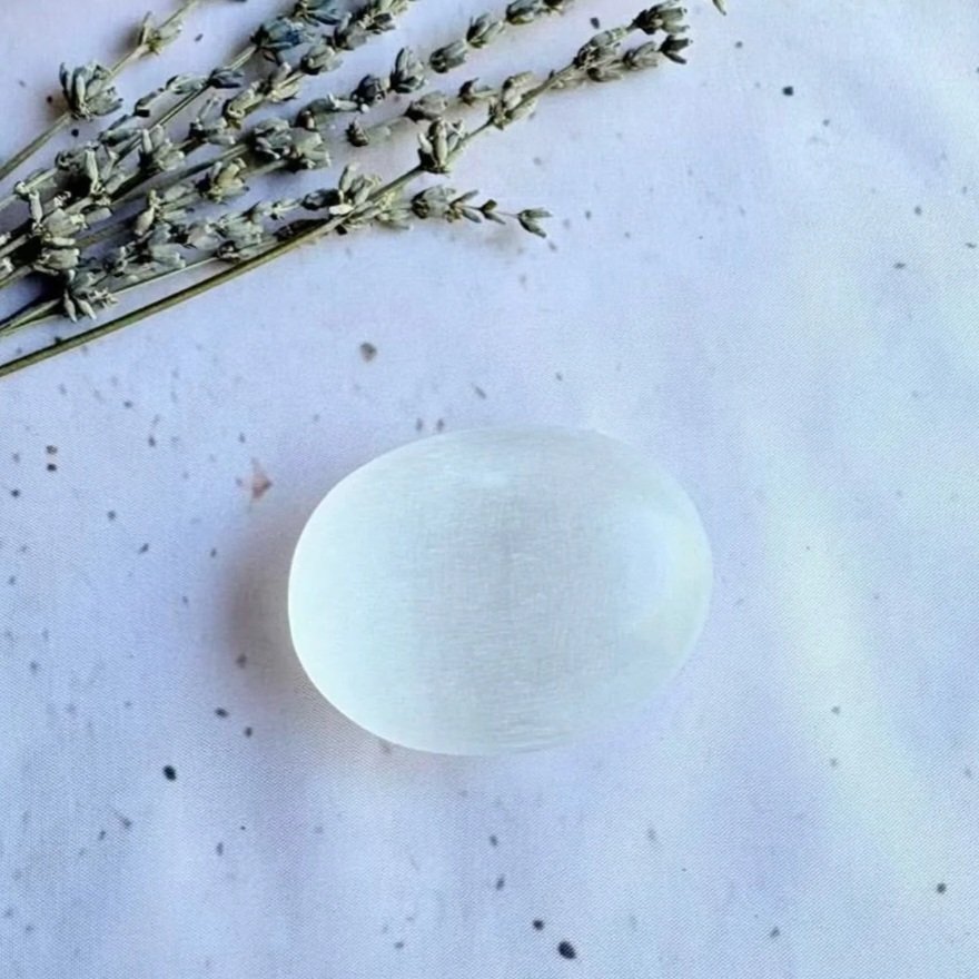 Large Satin Spar palm stone featuring natural fibrous patterns and silky glow