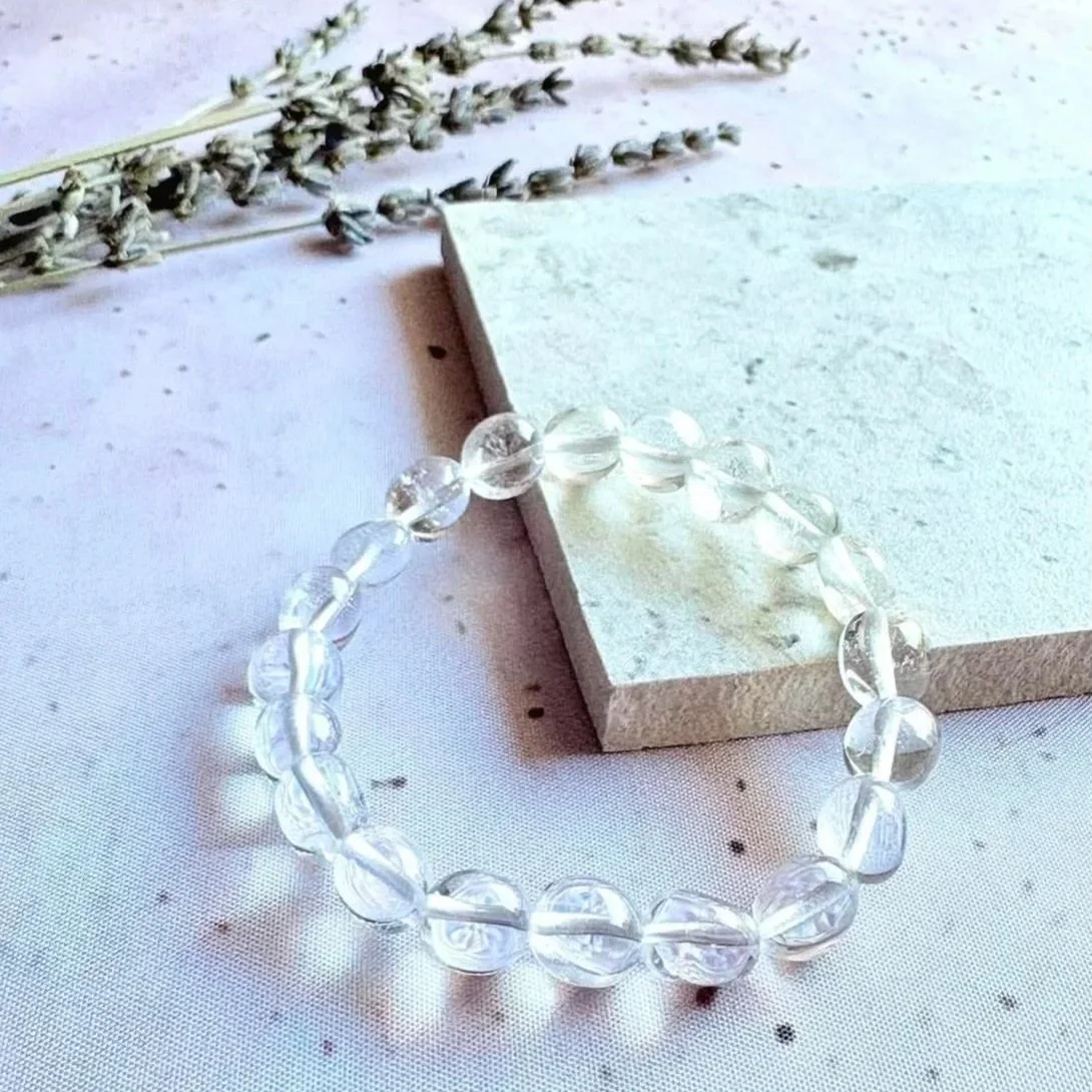 Clear Quartz bead bracelet associated with clarity, focus, and energy amplification