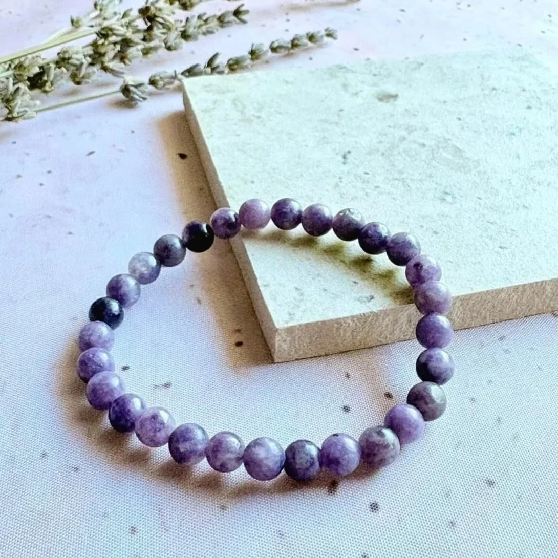 Lepidolite bead bracelet associated with relaxation, calm, and peaceful sleep