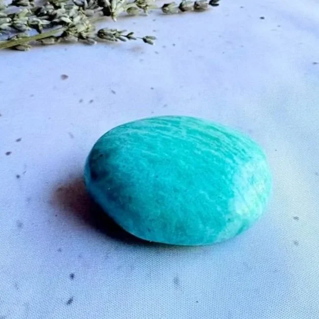 Amazonite palm stone measuring approximately 5cm long