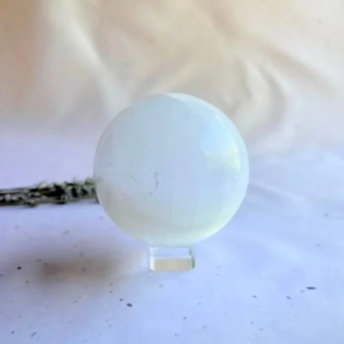 Natural Satin Spar sphere measuring approximately 8cm in diameter