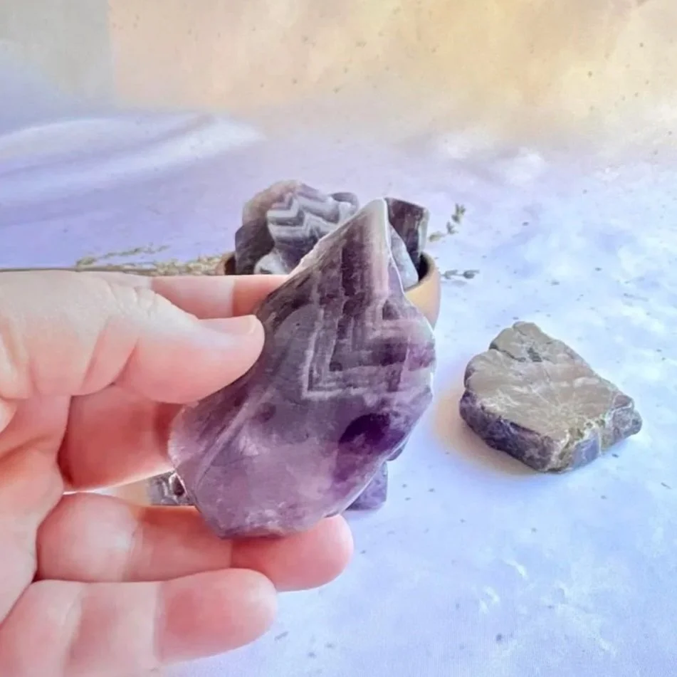 Polished Dream Amethyst slab displaying natural purple and white banding