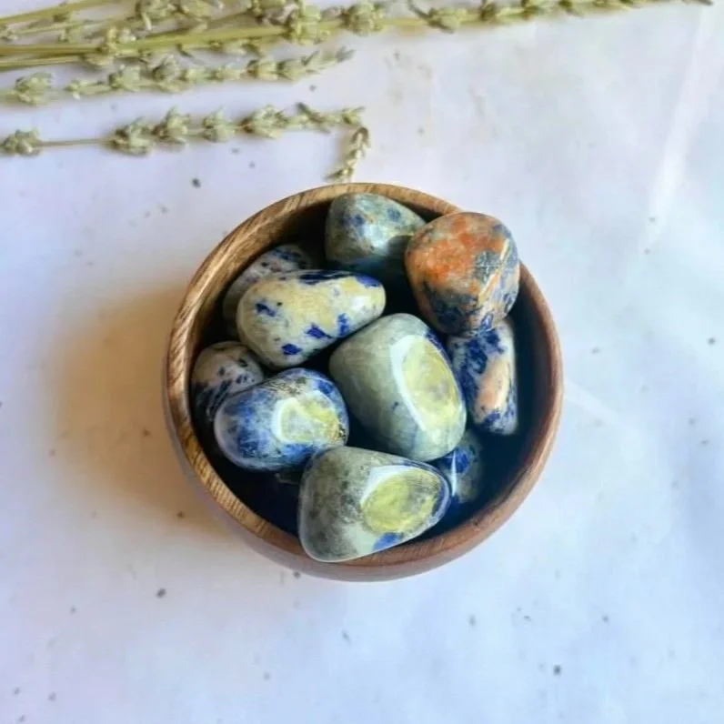 Sodalite tumble associated with communication, intuition, mental clarity, and emotional balance