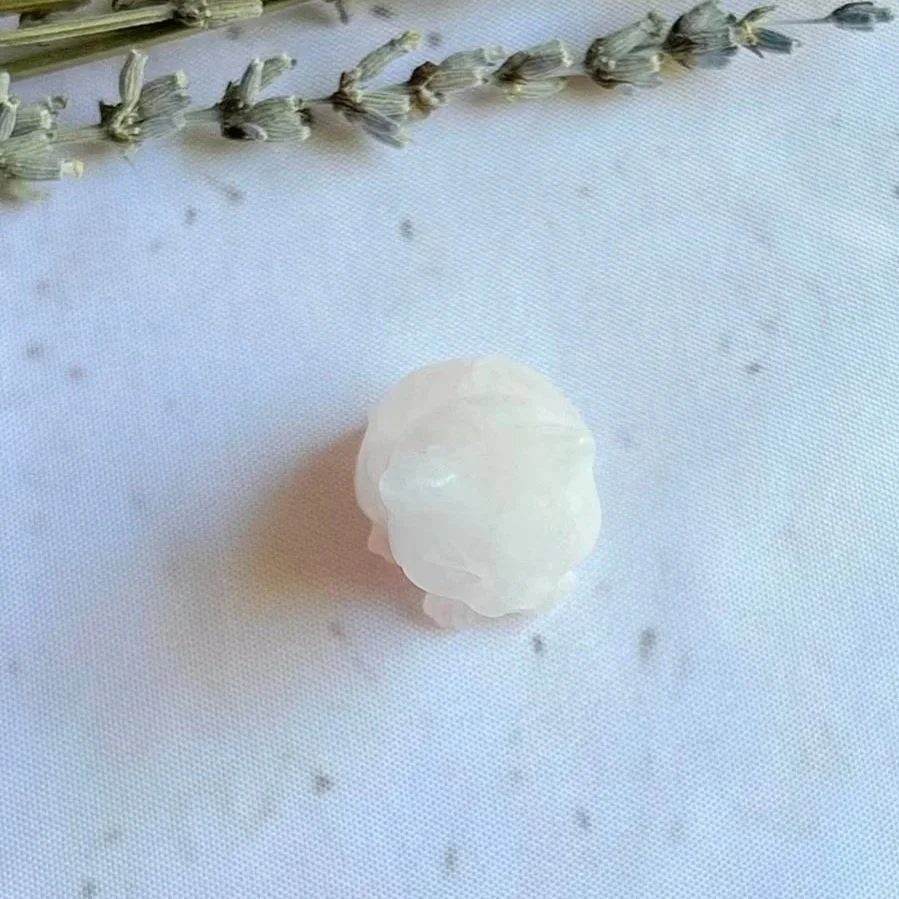 Natural Rose Quartz sitting cat carving measuring approximately 3cm tall