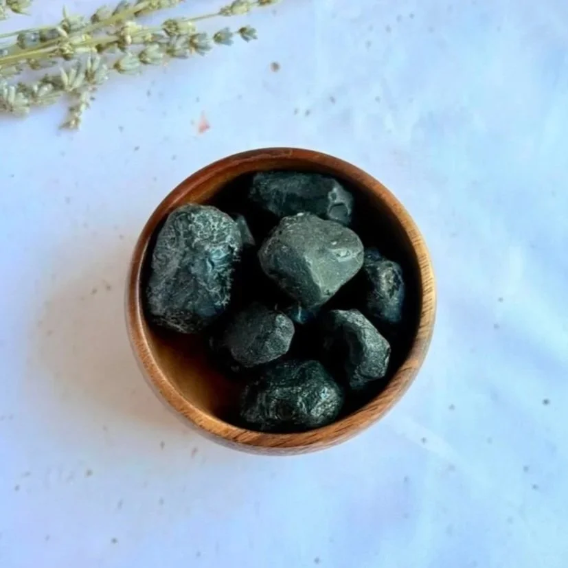 Apache Tear obsidian associated with grounding and protection