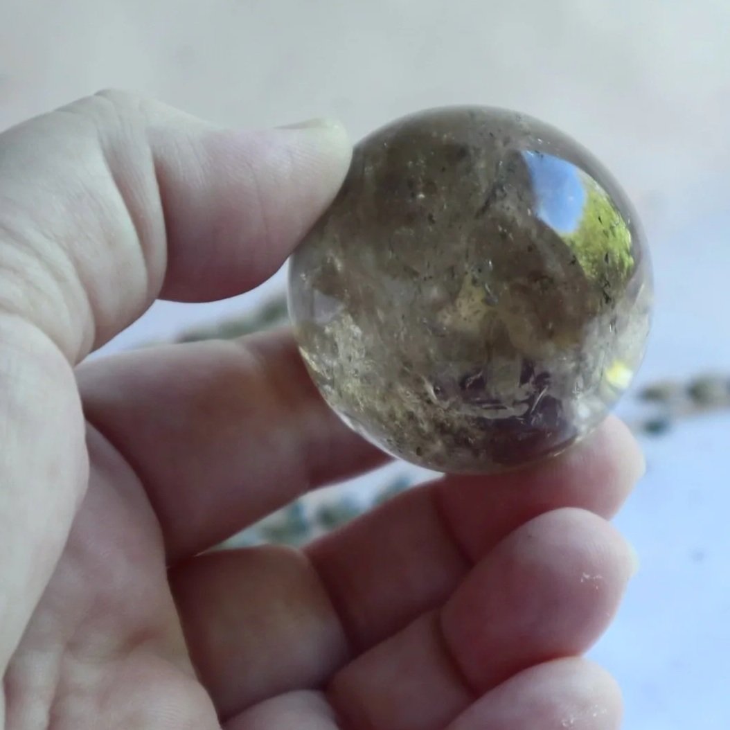 Polished Smokey Quartz crystal sphere approximately 13cm circumference