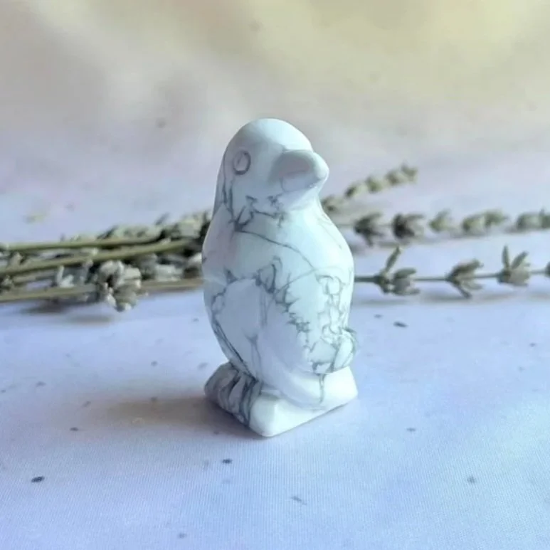 Natural Howlite penguin crystal carving measuring approximately 5cm tall