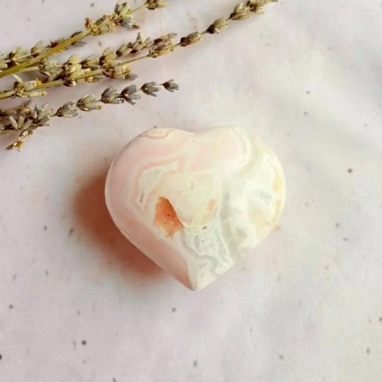 Natural Mangano Calcite crystal heart with soft pink colouring