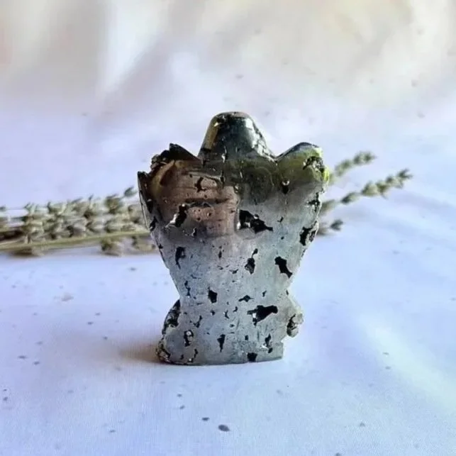 Natural Pyrite Angel displaying golden metallic colouring and carved details