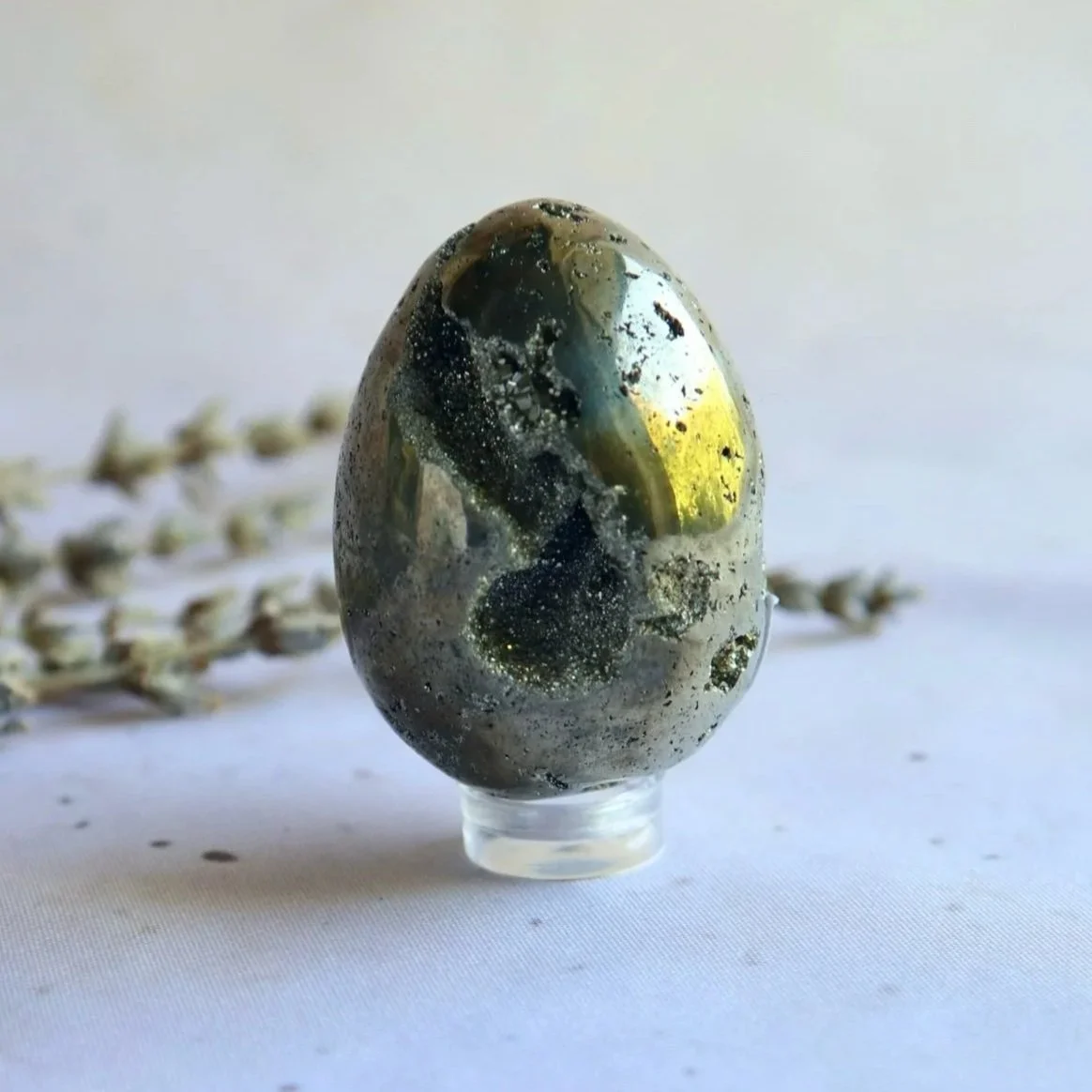 Polished Pyrite crystal egg with metallic golden colouring