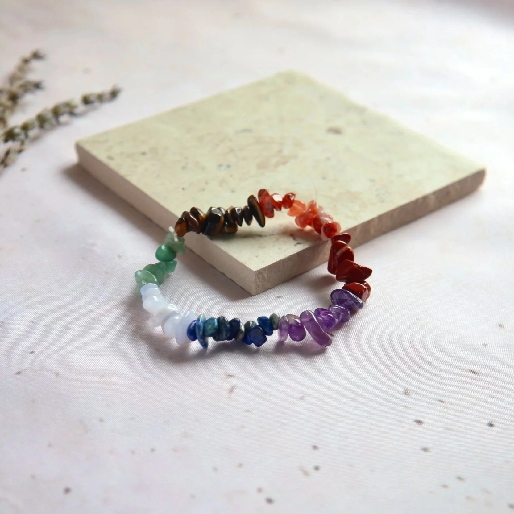 Colourful Chakra crystal chip bracelet with natural variations in each stone