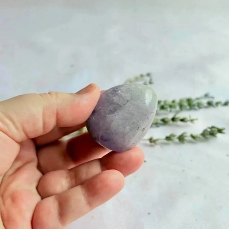 Oval-shaped Amethyst crystal freeform lying flat