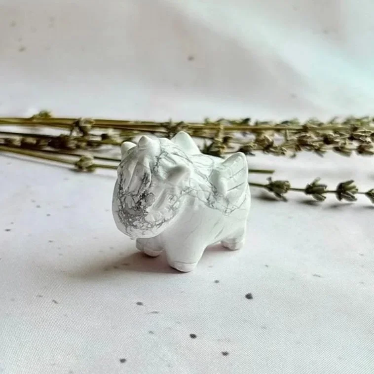 Natural Howlite Pegasus crystal carving measuring approximately 4.5cm tall