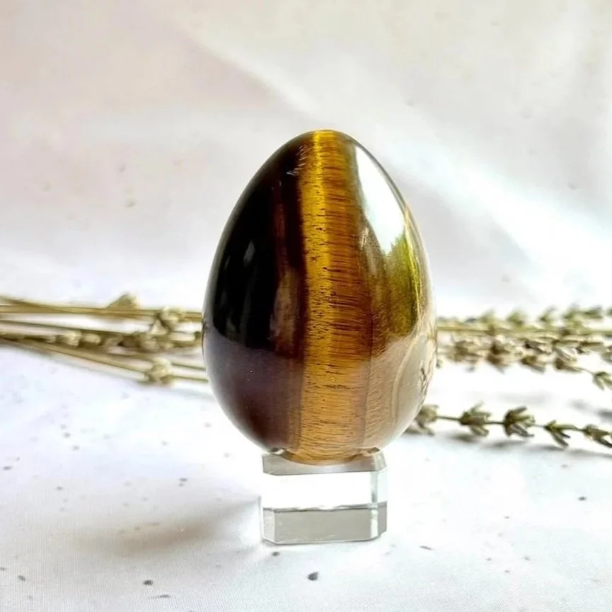 Natural Tiger's Eye crystal egg with golden brown bands