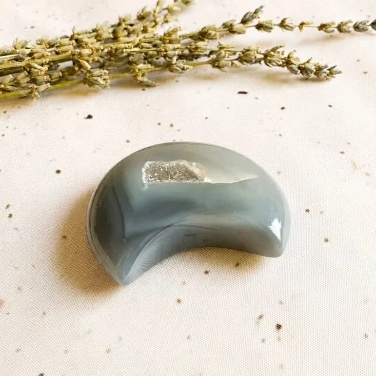 Natural Agate crescent moon featuring sparkling druzy crystals and soft purple-grey colouring