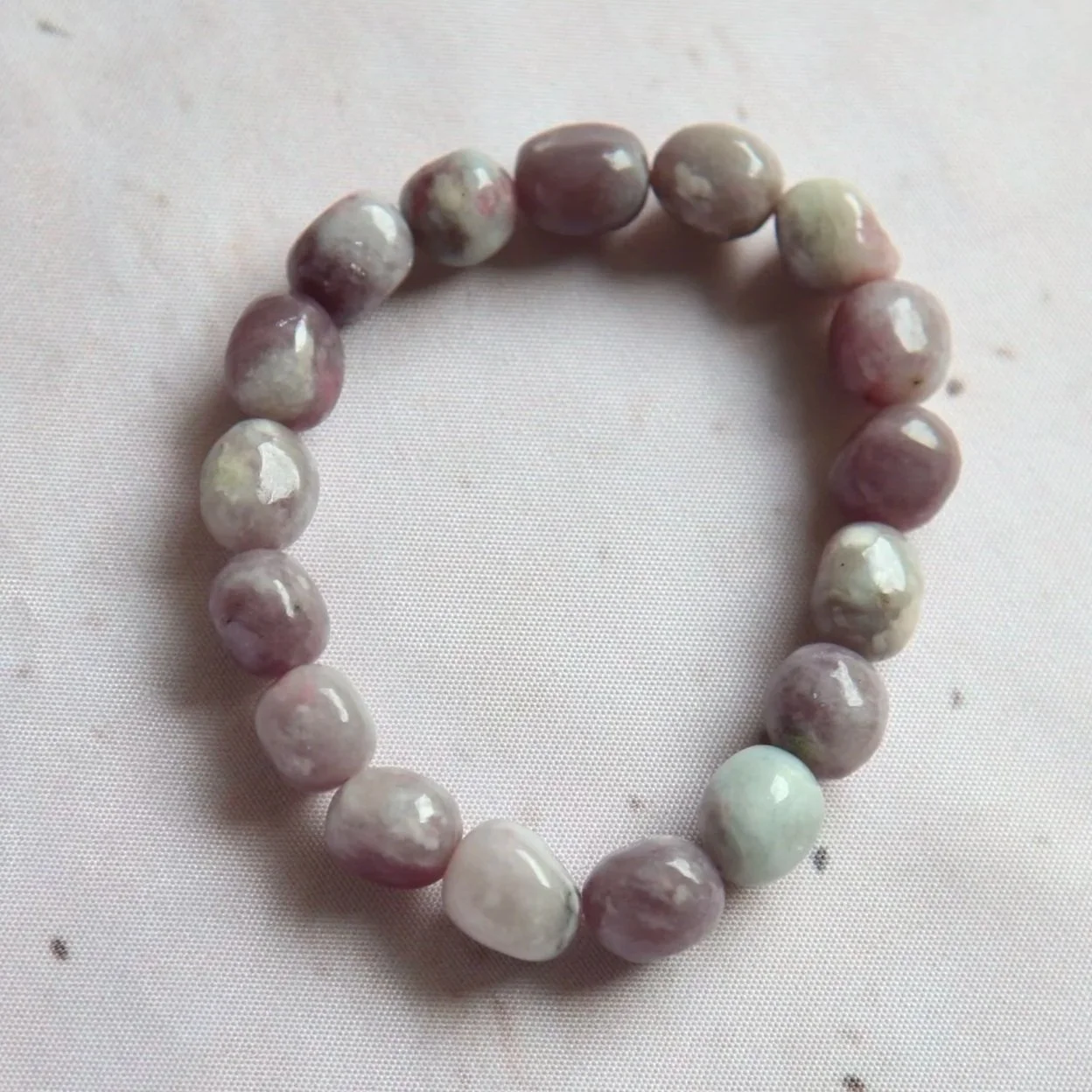 Quartz with Pink Tourmaline bead bracelet featuring clear Quartz beads with natural pink Tourmaline inclusions