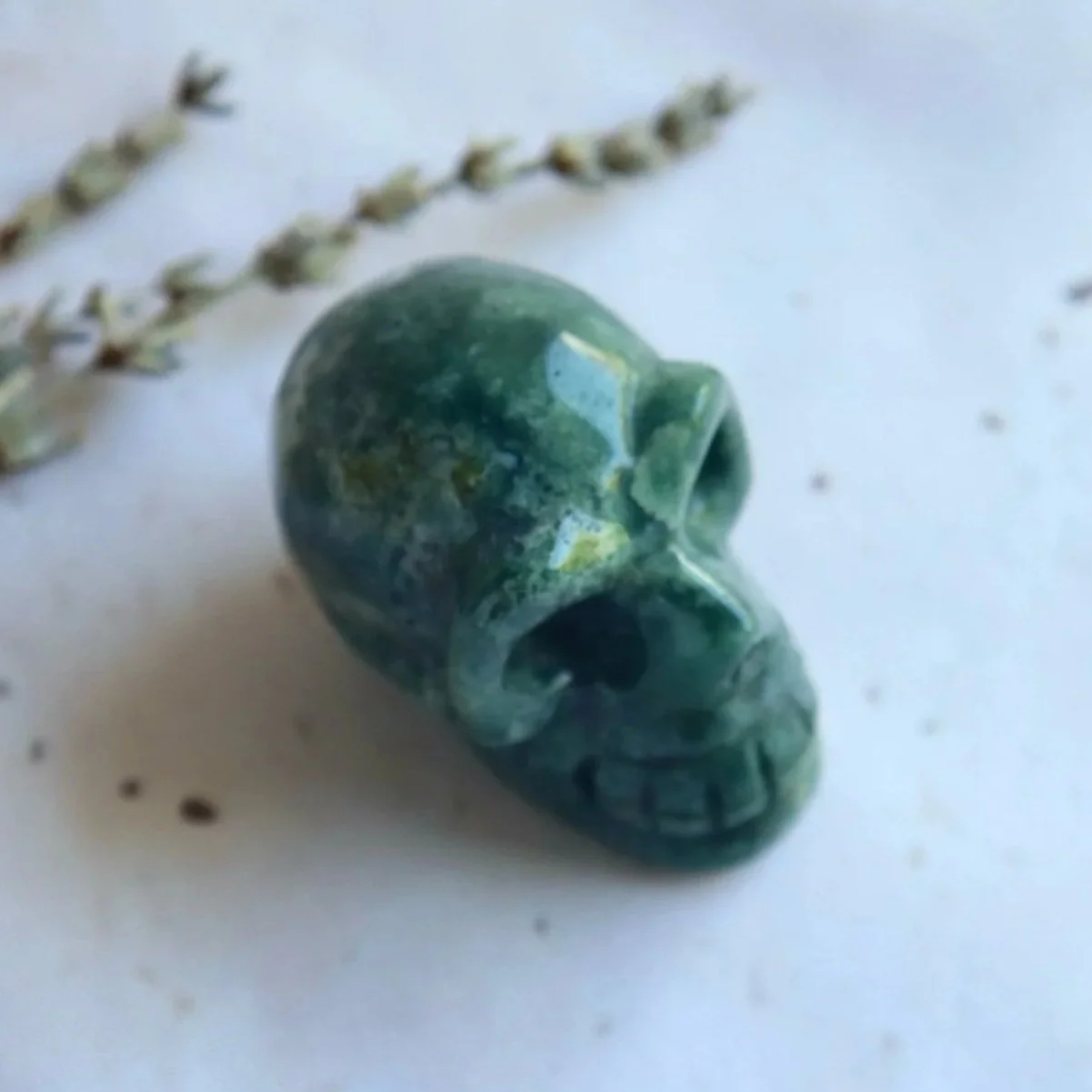 Exact Green Moss Agate skull with natural inclusions and markings