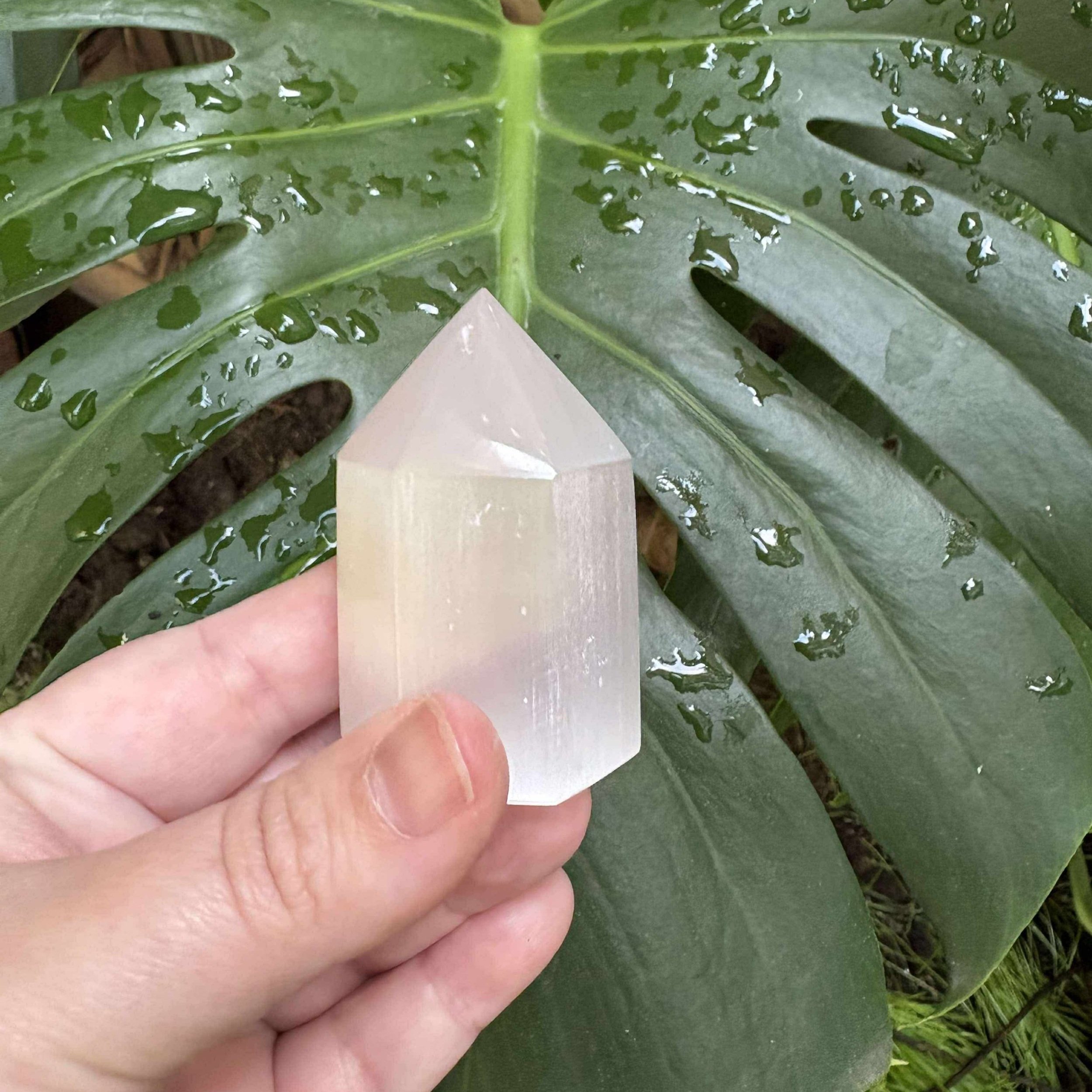 Polished Satin Spar tower, pearly white crystal for aura cleansing and meditation