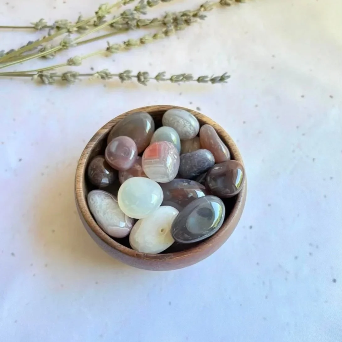 Natural Agate tumble associated with balance, grounding, and emotional stability