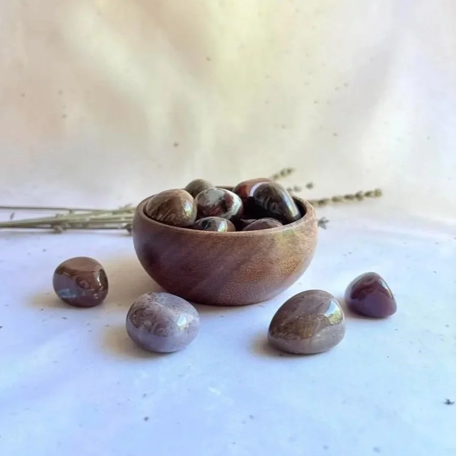 Bloodstone tumble associated with courage, strength, grounding, and resilience