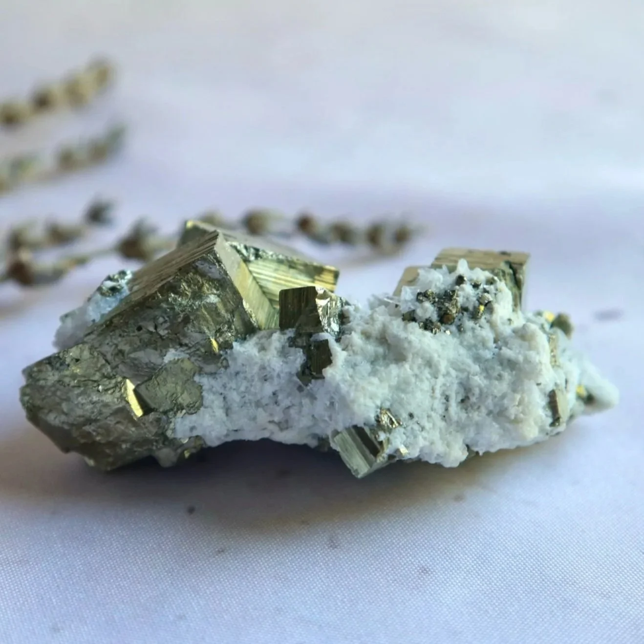 Large Pyrite in Quartz mineral cluster approximately 8cm wide