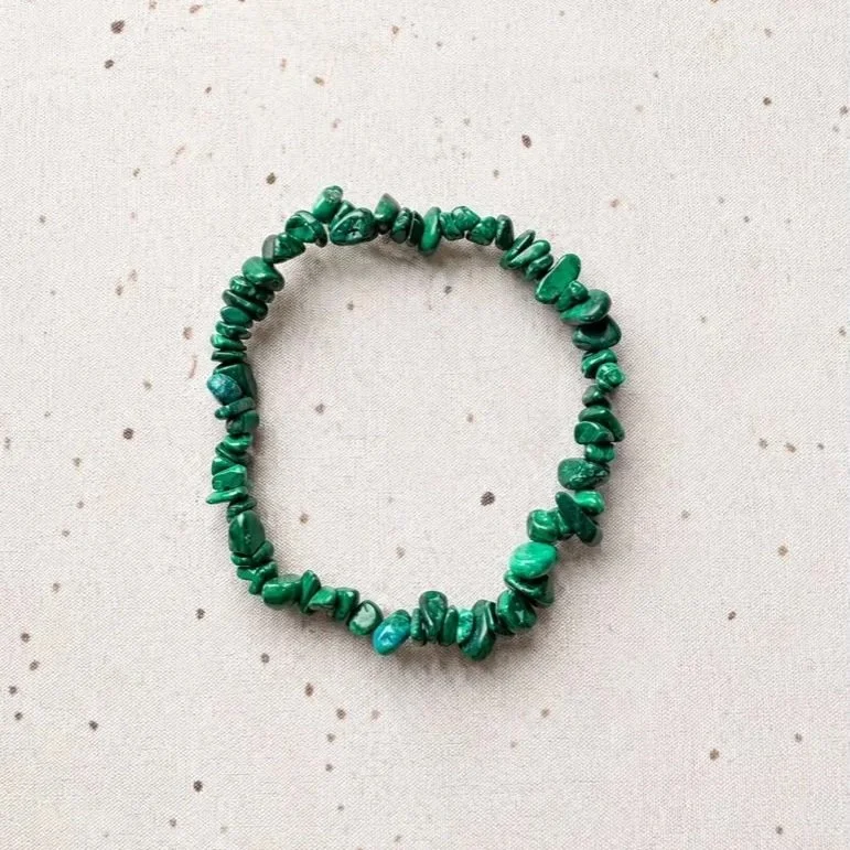 Stretch Malachite crystal chip bracelet displaying natural green banding and unique patterns