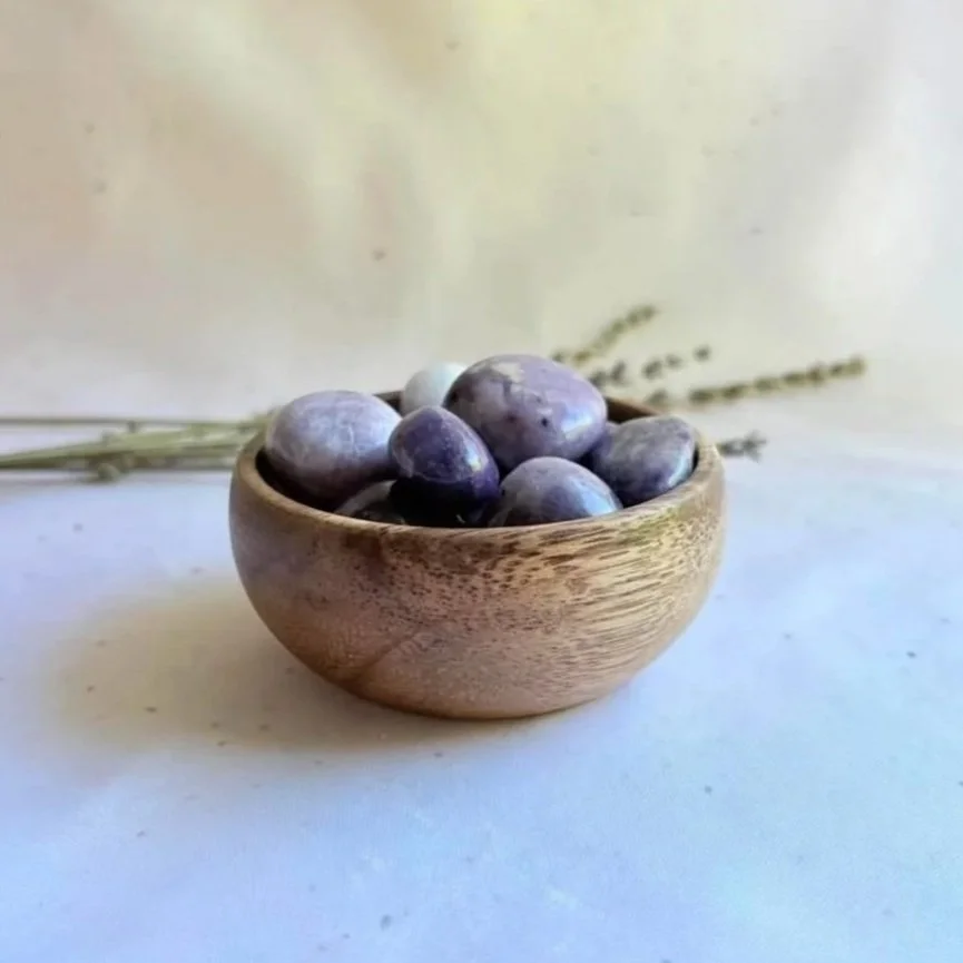 Lepidolite tumble weighing approximately 16 grams with natural purple colouring