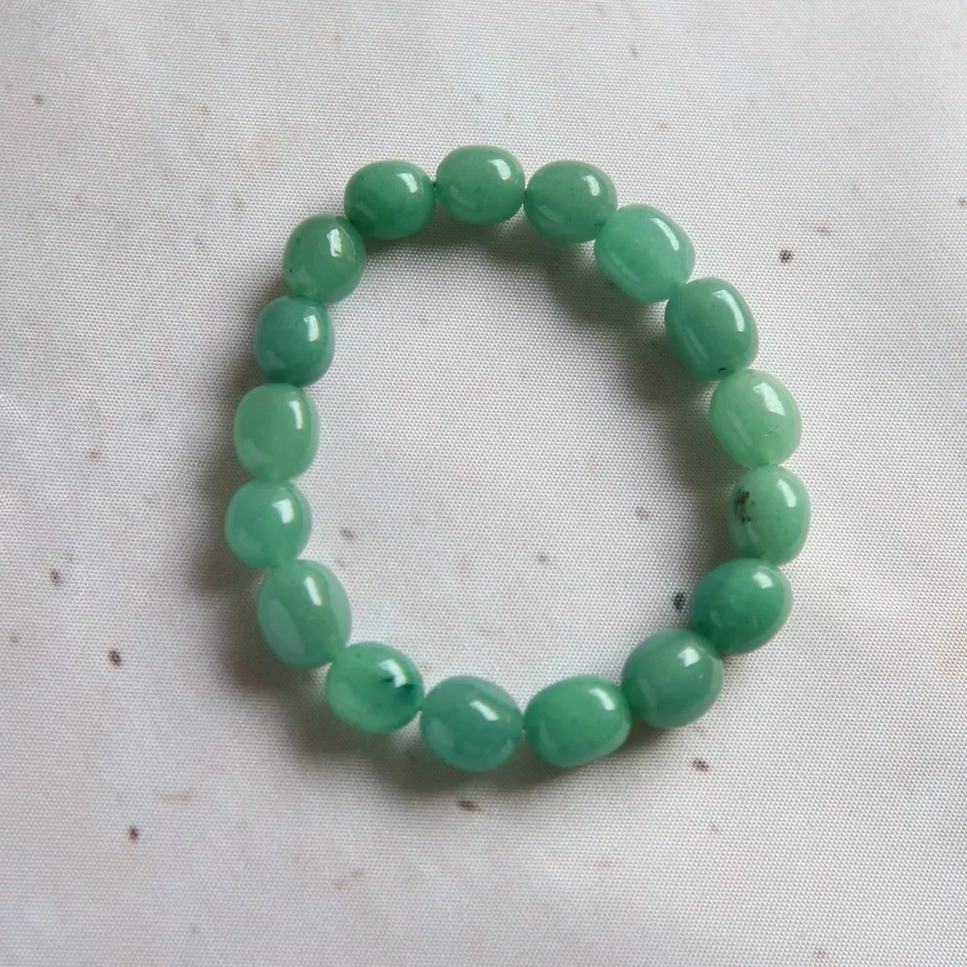 Green Aventurine tumble bead bracelet featuring smooth polished beads with natural green colouring