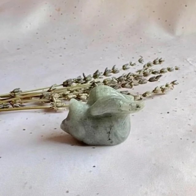 Natural Labradorite crystal cat with wings displaying flashes of colour