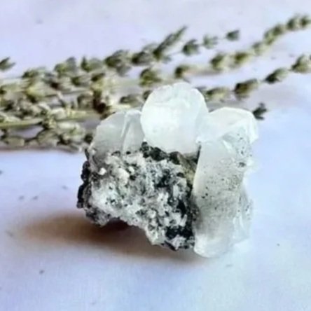 Close-up of golden Pyrite crystals naturally embedded within Quartz