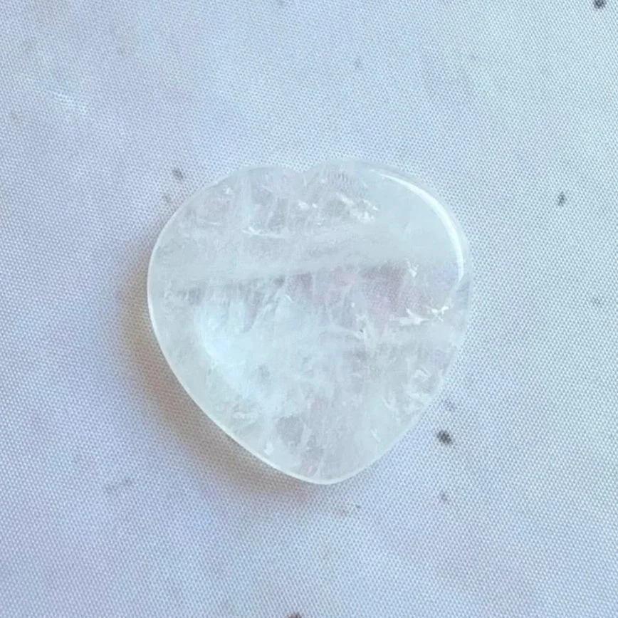 Polished Clear Quartz heart worry stone measuring approximately 4cm