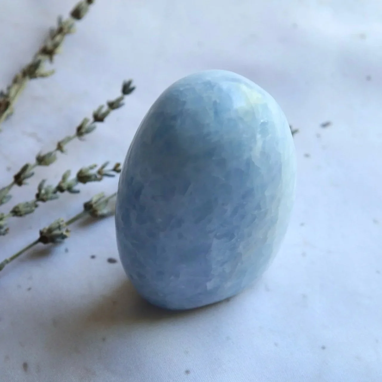 Polished Blue Calcite freeform with natural internal variations