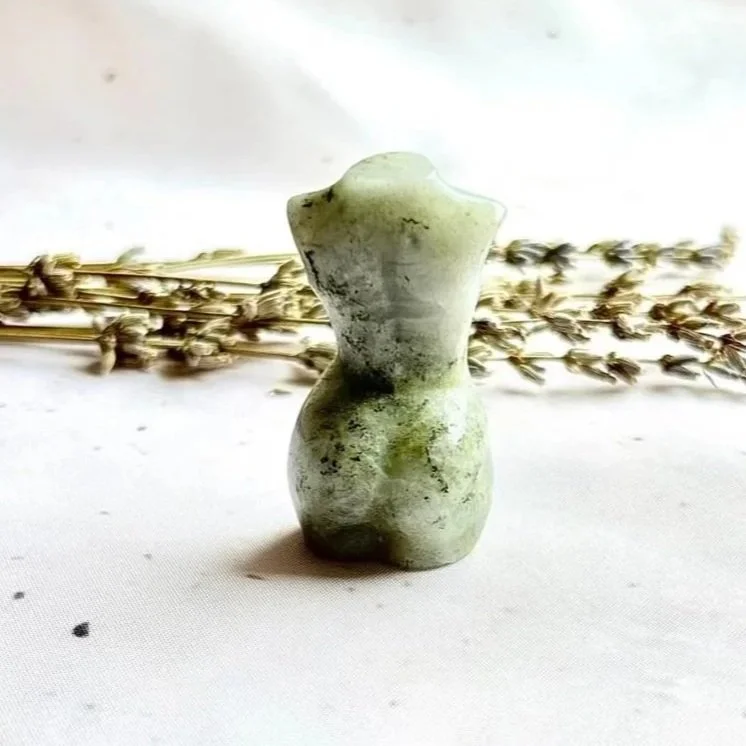 Natural Labradorite carving celebrating the feminine form