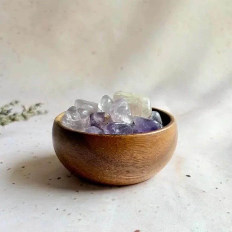 Natural Amethyst tumble displaying rich purple colouring and polished finish