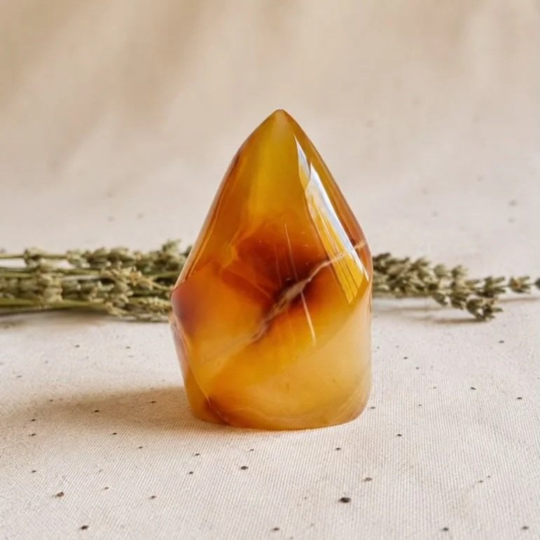 Polished Carnelian crystal flame displaying vibrant orange and red natural colouring