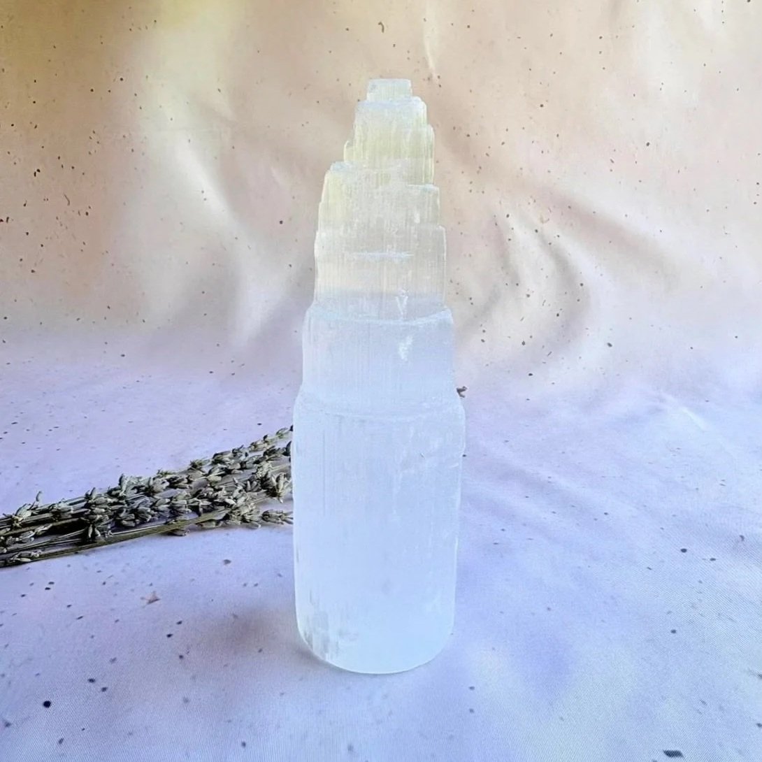 Natural Satin Spar tower measuring approximately 15cm tall with a layered textured finish