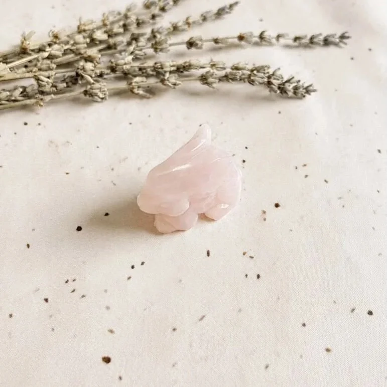 Hand-carved Rose Quartz crystal bunny featuring soft pink colouring
