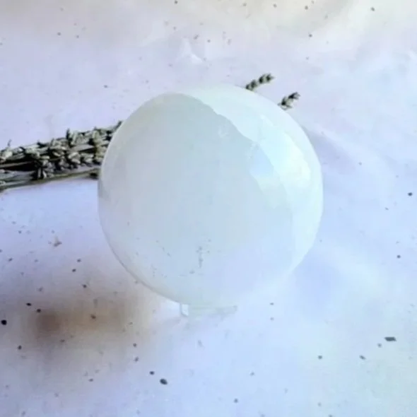 Satin Spar crystal sphere commonly sold as Selenite with a silky luminous glow